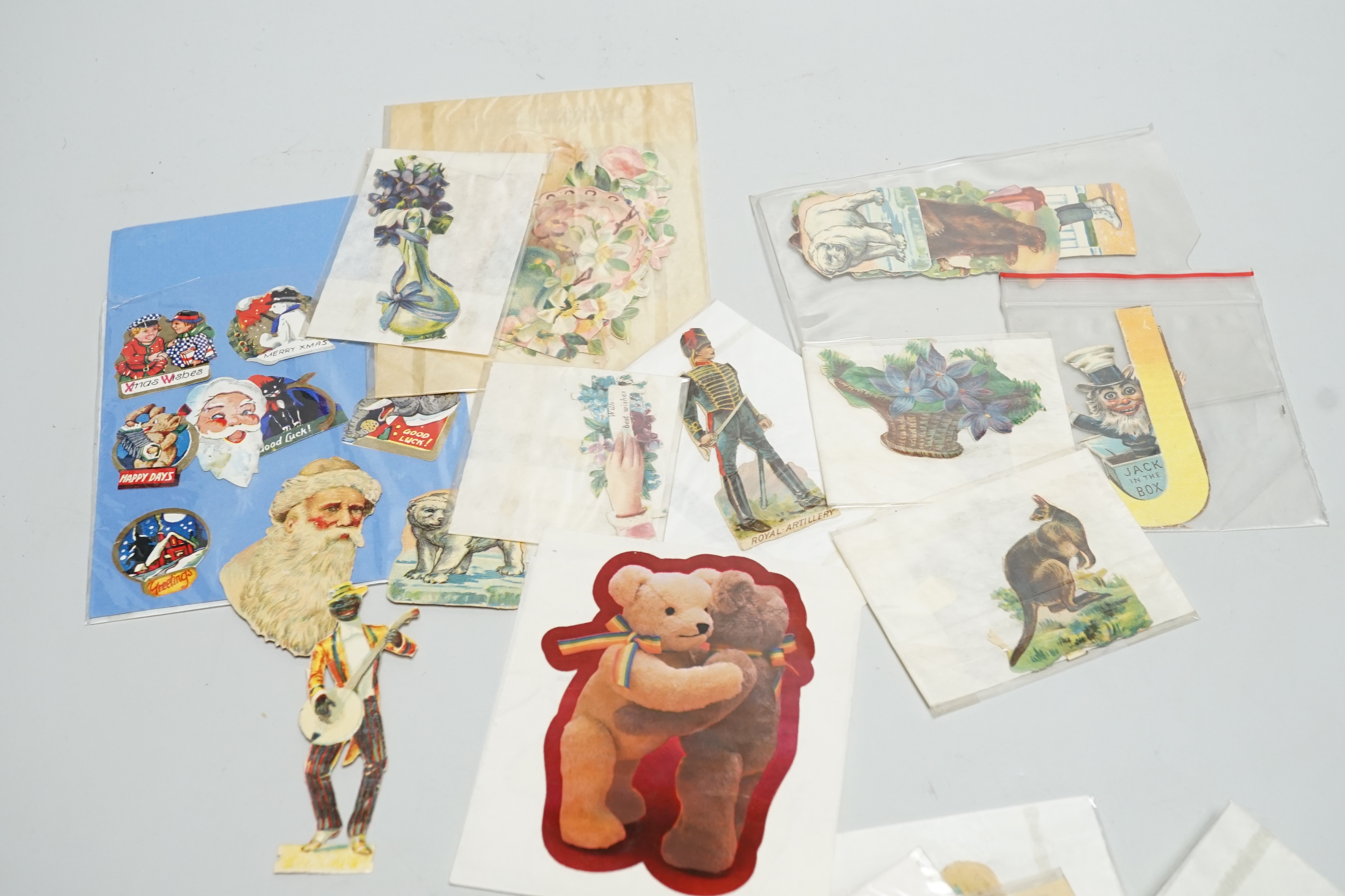 Assorted box of scraps and ephemera including postcards, and early photographs of children with their bears